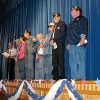 Tonasket High School students honored local veterans in a special assembly held last Friday, Nov. 9. Roger Castelda (far left) was one of several veterans gathered on the stage to speak with the students during the assembly.