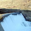 A view of the spillway of Enloe dam from the west bank of the Similkameen River. Okanogan County PUD recently released their Draft License Application to the Federal Energy Regulatory Commission for relicensing the hydroelectric dam.