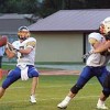 Tonasket Tiger Quarterback Sean Timmerman draws back for a pass. Timmerman made the first team for the CTL All League Football as a quarterback on offense and as a lineman on defense, as well as a punter.