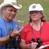 Photo by Gary DeVon<br>Walt and Vicki Hart get an up close look at one of the many species of butterflies that inhabit the Sinlahekin Wildlife Area during last year’s Watchable Wildlife Weekend. Dale and Kathy Swedberg will lead the tour in one of the e
