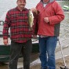 The big largemouth bass weighing 1.82 pounds was caught by the team of Jim Barker (left) and Cliff Applebee.