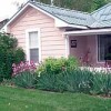 Photo by Gary DeVon<br>Cut ‘n’ Edge of Tonasket can add flowers and landscaping to people’s homes. LynAlan and Susan Koehn own the new business and recently used their skills on this Oroville area home.