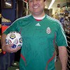 Submitted photo<br>Ernesto Cerillo of Allen’s Auto Parts earned a trip to the Mexico - China soccer match in Seattle and won a signed jersey with signatures of Mexican soccer greats.