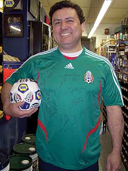 Submitted photo<br /></noscript>Ernesto Cerillo of Allen’s Auto Parts earned a trip to the Mexico – China soccer match in Seattle and won a signed jersey with signatures of Mexican soccer greats.” title=”367a” width=”” height=”” class=”size-FULL”>
<p class=