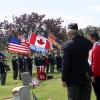 <html> <head> </head> <body> <p><i>Photo by Gary DeVon</i> </p> <p> Ardie Halvorsen and Dee Patterson laid a wreath at the headstone of Major Hodges. The Oroville American Legion Post is named in honor of Hodges who died in World War I. Aft