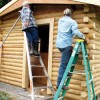 <html> <head> </head> <body> <p align="right"><i>Photo by Amy Veneziano</i> </p> <p>Three members of the Comancheros put the finishing touches on the new beer garden building at the Tonasket Rodeo Grounds. The building is made from the same lo