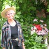 <html> <head> </head> <body> <div align="right"><i>Photo by Gary DeVon</i> </div> <p> </p> <p> Darlene Owyn stands beside one of the garden features at the lakeside home she and her late-husband Allan purcha
