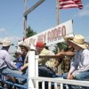 <p align="right"><i> Photo by Gary DeVon</i></p><p> GOOD DAY TO BE A COWBOY - A little bull pen action was taking place above the chutes. The Chesaw Fourth of July Rodeo has attracted cowboys (and cowgirls) over several gener