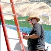 <p align="right"><em>Photo by Gary DeVon</em></p><p> Artist David Heck began his part of the Centennial Mural Project with a painting of a local vineyard. The Bothell-based artist is well-known for his work on the west side of the state where he has be