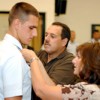 <p align="right"><em>Submitted photo</em> <br /></p><p>Michael and Karen Hicks traveled to North Carolina for their son’s graduation from the Coast Guard’s Rescue Swimmer Program. Here they participate in the “pinning†ceremony.