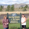 <p align="right"><em>Photo by Gary DeVon </em></p><p>Jennifer Finsen (left) and her sister Carrie Buckmiller near the sign for the new River’s Edge Embroidery store. Finsen, who used to work at Ethyls on Main Street in Oroville, is opening the busi