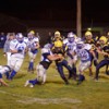 Photo by Eric Teala Photography Hornet Luke Rowton tries to negotiate through traffic at last Friday’s home game against the La Salle Lightning. Rowton had four receptions for 60 yards and a touchdown.
