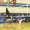 Photo by Terry MillsJunior Wade Detillian, on left, and Brandon Wahl and Josh McDaniel on the right during the juniors vs. seniors Macho Man Volleyball match on Wednesday, Nov. 12.