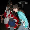 Miss Tonasket Rodeo Queen 2009 Kelsey Gallas helped lead children to Santa during Winter Fest on Friday, Dec. 5 so that they could tell him what they want for Christmas.Photo by Emily Hanson