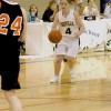 The Lady Hornet's Kayla McKinney brings the ball down court against the Entiat Tigers. McKinney, a 5'5" junior places in the guard position and is one of the Hornet's best ball handlers.