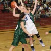 <p class=PhotoByline align=left style='text-align:left;text-indent:.5in'><spanstyle='font-size:12.0pt;font-family:"Times New Roman";font-weight:normal'>Tonasket senior Cierra Silverthorn leaps over two LakesideHigh School players during the Lady Tiger’s
