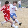 Photo by Terry MillsTonasket sophomore Keegan McCormick tries to steal the ball from a Brewster player during the soccer game on Tuesday, March 24. Tonasket lost at home to Brewster 8-0.