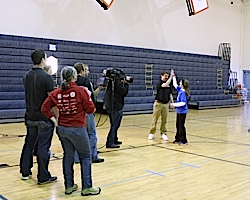 Bailey Griffin (far right) with the Kellogg's film crew in the Tonasket Elementary School gym on Wednesday, Feb. 11. Griffin is one of four finalists for the Kellogg's Frosted Flakes Earn your stripes (ESPY) program and has the chance to win the second an