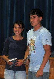 Photo by Emily HansonSenior Veronica Puente and junior Corey McCrarey were awarded with plaques as the Track and Field captions during the banquet on Monday, June 8.