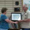 Oroville City Clerk/Treasurer Kathy Jones being honored by Oroville Mayor Chuck Spieth for 35 years of dedicated service to the city. Photo by Emily Hanson