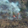 A fire on Whiskey Mountain being fought on Thursday, July 23. The fire, along with 97 others in Okanogan, Ferry, Stevens and Ponderay counties, as well as the north half of Lincoln County, were caused by lighting strikes from July 23 through Sunday, July