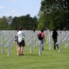 Row after row of white crosses and Stars of David, fill the Normandy American Cemetery in France. The burial ground overlooks Omaha Beach, site of part of the D-Day Invasion. Photo by Gary DeVon