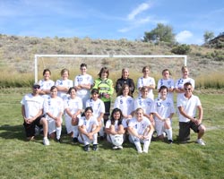 Photo by Terry MillsKicking the ball this season with a new head coach, the 2009 Tonasket girls’ soccer team is, in the back row, left to right: Kelly Cruz, Alicia Edwards, Shelby Olma, Stefanie Bruner, Angela Vaughn, Ashley Booker, Alyssa Holbert and M
