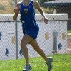 Jessica Spear of Tonasket beginning her second lap on the Tonasket course during the cross country meet on Saturday, Sept. 12. Spear finished in fourth place with a time of 20:53.Photo by Emily Hanson