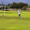 Manson lines up to take a shot at the goal with Hornet goalie Taylor Sariento defending. She had "great play" in the second half, according to Coach Laura Kinman. Photo by Les Bowen