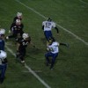 Tonasket junior wide receiver Tyler Laurie trying to evade Cashmere’s senior line backer Christian O’Neal during Tonasket’s loss at Cashmere on Friday, Oct. 9. Also shown are senior quarterback Wade Detillian (12), senior running back Andrew Grillo
