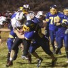 Tonasket defensive back Keegan McCormick tackling an Omak running back on Thursday, Oct. 29. The Pioneers were too fast for the Tigers and Tonasket lost at home 48-7. Photo by Terry Mills