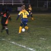 Naomi Peters moves the ball across the field in a home match against Bridgeport last Thursday. The Hornets lost after two sudden-death tie-breakers after regulation play. Photo by Gary DeVon