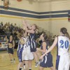 Oroville senior Kayla McKinney making a shot over Tonasket junior Jerian Ashley during Oroville’s away game at THS on Tuesday, Dec. 8. Also shown is Tonasket junior Shelby Olma (20). Photo by Terry Mills