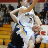 Tonasket sophomore Damon Halvorsen makes a layup shot against Cascade Christian during the Tigers first game at the Brewster Tournament on Tuesday, Dec. 29. Photo by John Cleveland, II