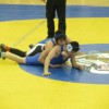 Tonasket junior Tyler Laurie holding down Warden’s Cesar Rangel as he attempts to turn him over during the 130 pound Championship Round at the Apple Pie Tournament in Tonasket on Saturday, Jan. 16. Laurie won by decision 5-2 for first place. Photo by Em