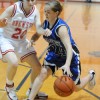 Tonasket junior Karen Keeton dribbles the ball down court while holding off a Brewster defender during Tonasket’s game in Brewster on Friday, Jan. 22. Photo by John F. Cleveland, II