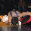 Ryker Marchand of Tonasket pinning Itzel Valera of Chelan in the 112 pound weight class on Friday, Jan. 29 during the Tiger’s final league match of the season. Photo by Emily Hanson