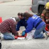 Students look on as EMS Coordinator Debra Donahue explains to them the dangers of drunk driving and how difficult it is to get someone out of a wrecked car.Oroville EMS Volunteers perform standard stabilizing procedures on the test dummy named Charlotte.S