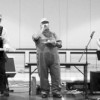 Superintendent Ernie Bartelson, Elementary Principal Joe Worsham and teacher John Ragsdale reward students with a selection of railroad songs.