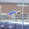 Tonasket sophomore John Stedtfeld bends over the bar in the high jump, clearing it, during the Tonasket Invitational track meet on Friday, April 16. Stedtfeld came in fifth place with a jump of 18-00.00. Photo by Emily Hanson