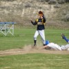 Tonasket senior Wade DeTillian slides safely onto third base after stealing while Oroville third-baseman Nicky Perez waits for the ball from catcher Brody Naysnerski during the first game of Tonasket’s doubleheader against the Hornets on Wednesday, Apri