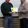 Oroville Mayor Chuck Spieth presents Mark Smith from USKH with a Certificate of Commendation for his quick action in administering CPR to a member of the paving crew working on Oroville’s Main Street Pedestrian Project. Spieth made the presentation at t