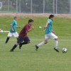 A Tonasket U15 soccer player on the Spectacle Lake Resort team kicks the ball down the field as an opponent from the Oroville Discount Fireworks team pursues him during the Youth Soccer Tournament on Saturday, May 22. The Spectacle Lake Resort team won th