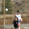 Tonasket junior Ashley Booker boots the ball away from an Omak opponent during Tonasket’s home game on Saturday, Oct. 16. Photo by Emily Hanson