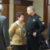Lacey Hirst-Pavek waits in handcuffs to be transported out of Douglas County Superior Court after a jury found her guilty of all charges, including first degree premeditate murder Tuesday, Nov. 16, in the killing of Michelle Kitterman.