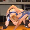 Tonasket’s Lee Leavell gets Oroville’s Nick Perez into a headlock as he works to throw him down to the mat during Tonasket’s match in Oroville on Wednesday, Dec. 8. Leavell won this match-up 5-4. Photo by Terry Mills