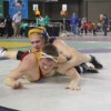 Oroville junior Duke Sykes tries to get Lake Roosevelt junior Sterling Shephard onto his back during the third round of the 171 pound weight class in the B Division at the 2011 Washington Mat Classic XXII Championships on Saturday, Feb. 19. Sykes lost to