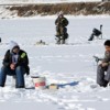 The Northwest Ice Fishing Festival was held on Sidley Lake last Saturday. Although the fish weren’t biting most of the 96 registered anglers in the contest said they had a good time trying to coax a rainbow on to their line under sunny skies. Photo by G