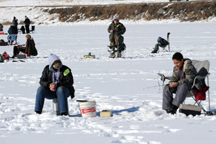 The Northwest Ice Fishing Festival was held on Sidley Lake last Saturday. Although the fish weren’t biting most of the 96 registered anglers in the contest said they had a good time trying to coax a rainbow on to their line under sunny skies. Photo by G