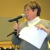 Joanne Morris of Oroville addresses the crowd at the Okanogan County Public Utilities District’s information meeting on Tuesday, April 19. She said the straw that broke the camel’s back for her in regards to the PUD’s rates was when she realized she